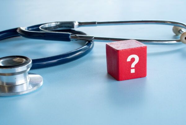 Stethescope with red question box